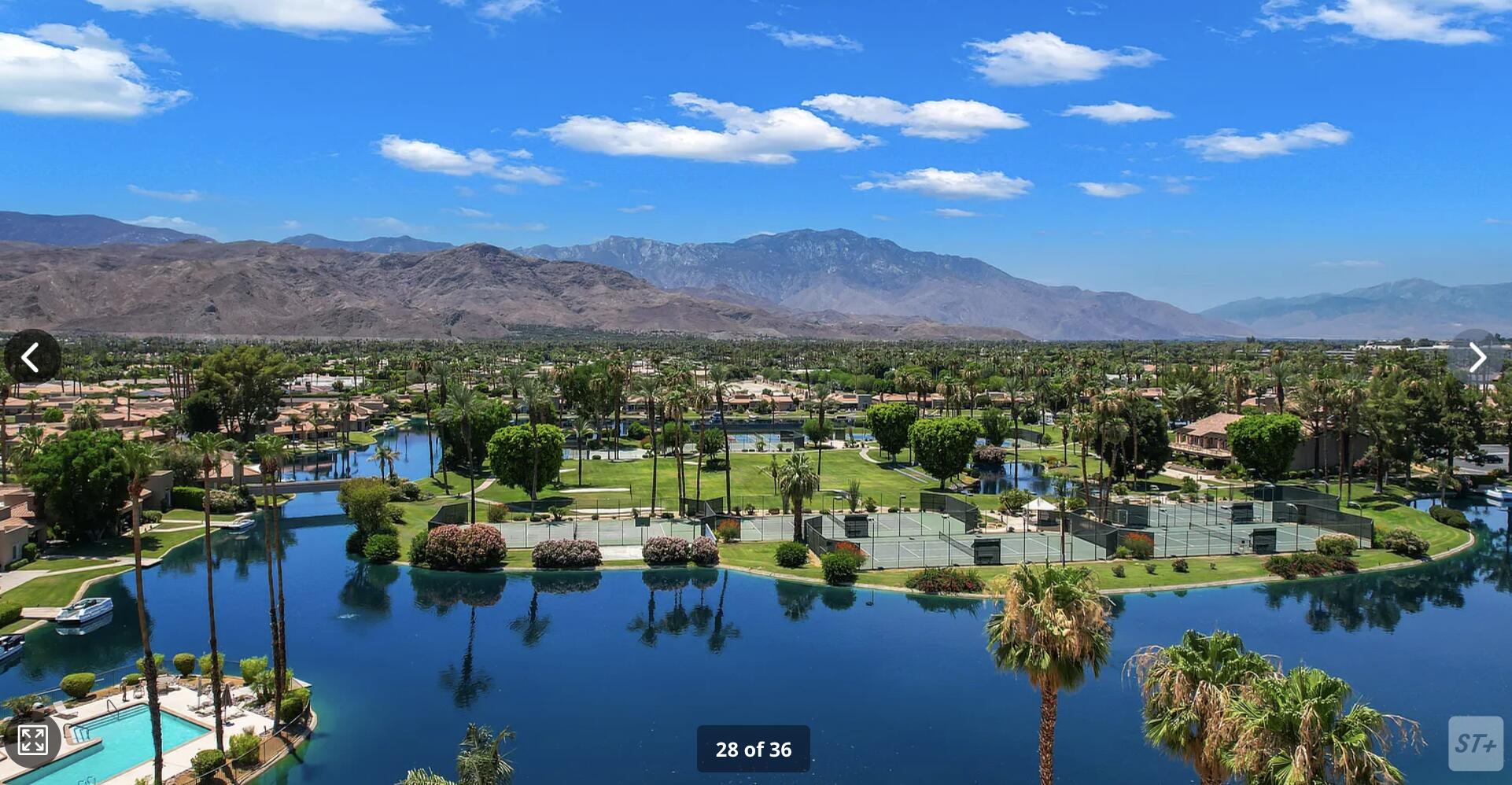 141 Lakeshore Drive Rancho Mirage, CA 92270 - Photo 30 of 34 a view of a city with mountains in the background