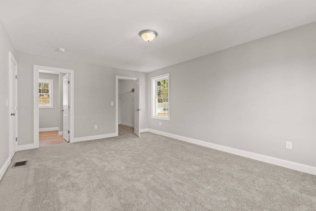 14 R Pne Hl Way, Unit 14 Harvard, MA 01451 - Photo 20 of 41 an empty room with windows and closet