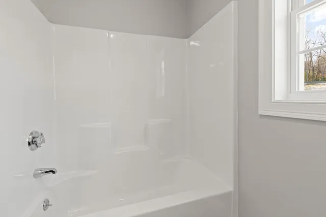 a close up of a bathtub