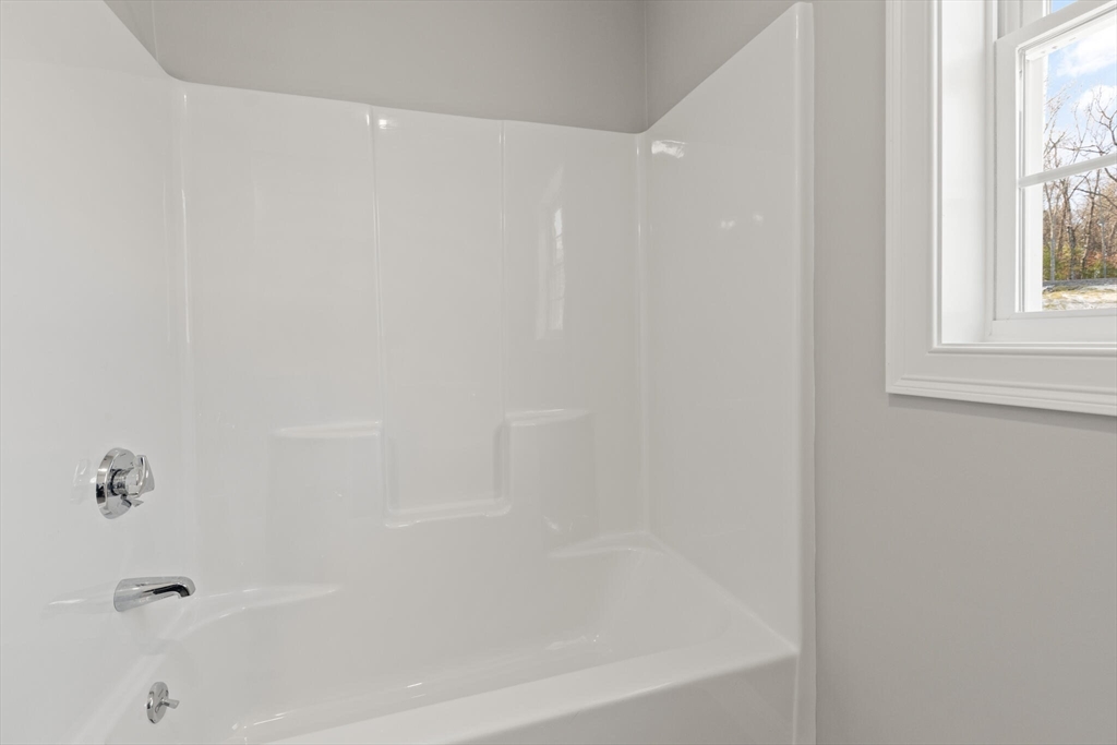 14 R Pne Hl Way, Unit 14 Harvard, MA 01451 - Photo 28 of 41 a close up of a bathtub