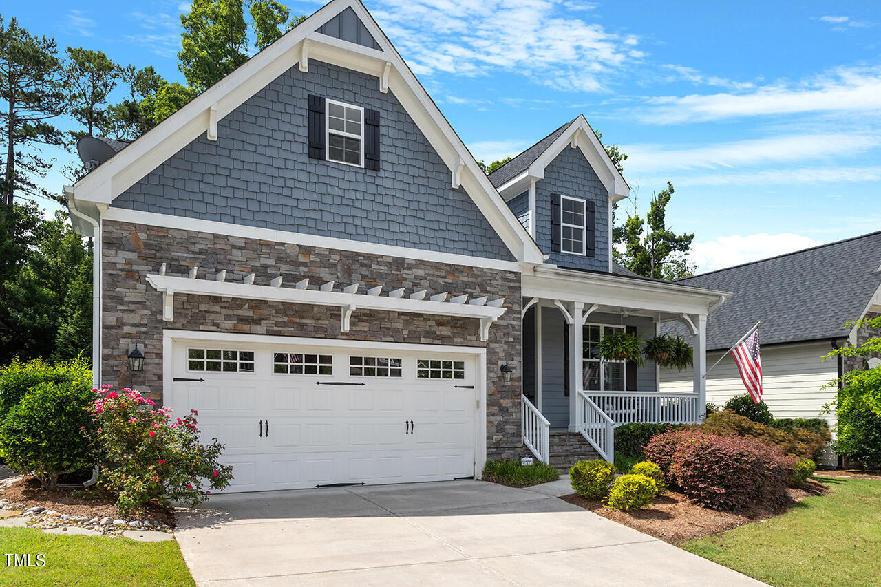 8028 Brandyapple Drive Raleigh, NC 27615 - Photo 2 of 26 Side view of front of Home