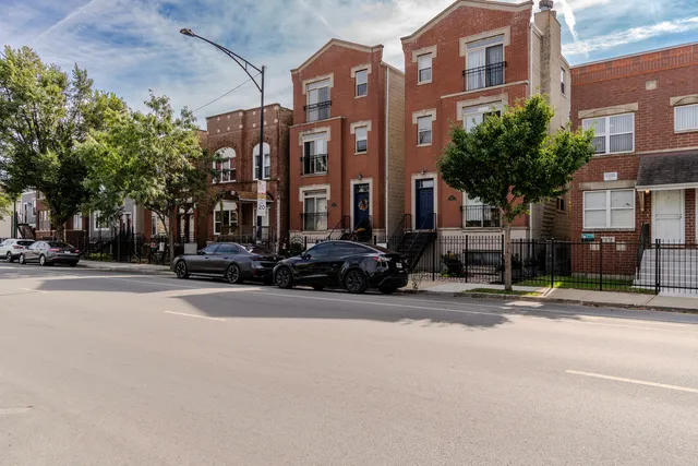 a view of a building with a street
