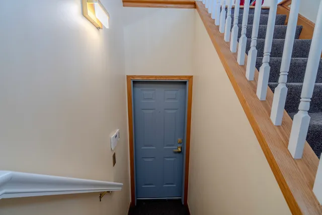 a view of entryway with wooden floor