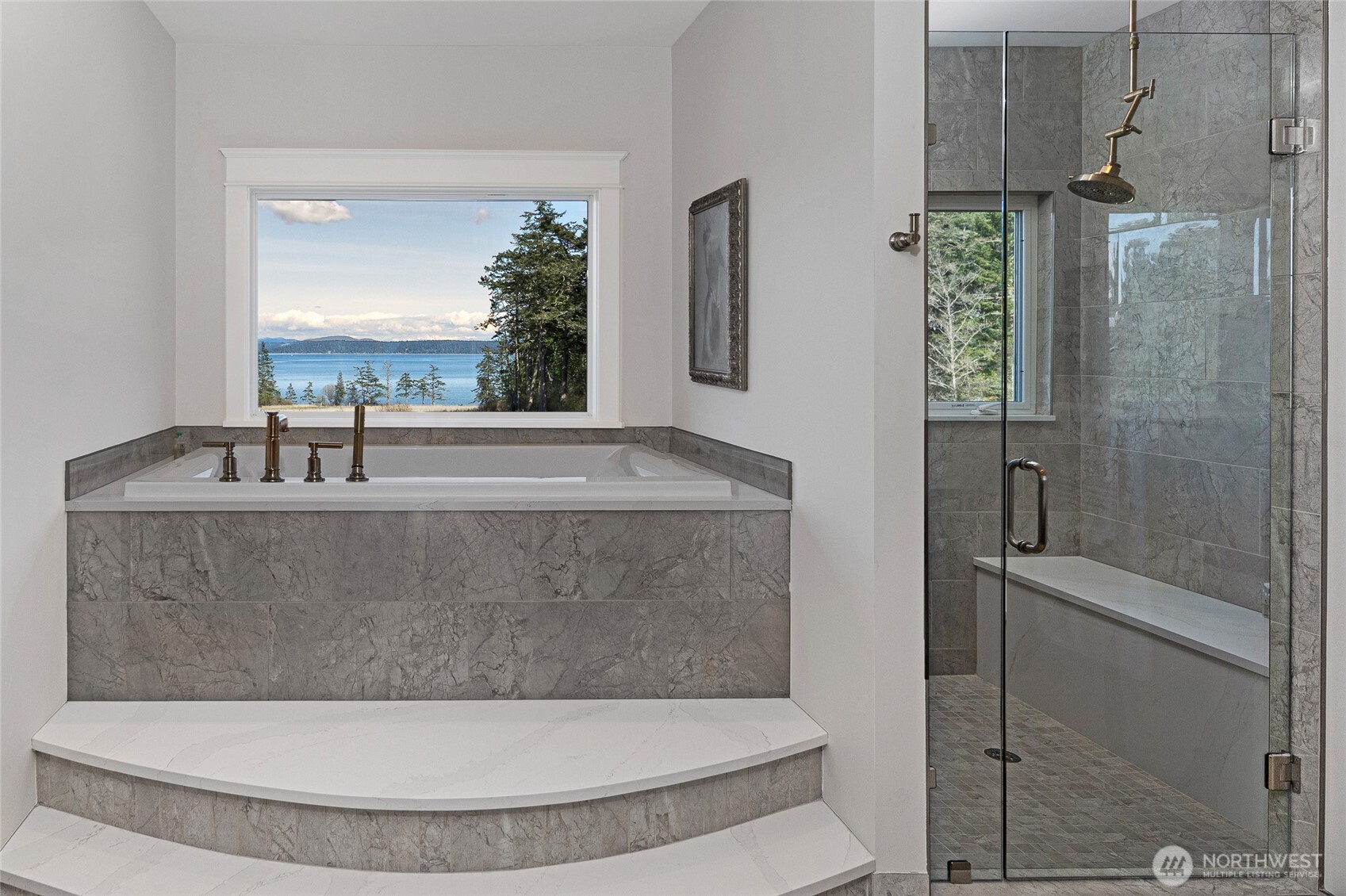 735 Rosler Road San Juan Island, WA 98250 - Photo 25 of 40 a bathroom with a sink and mirror
