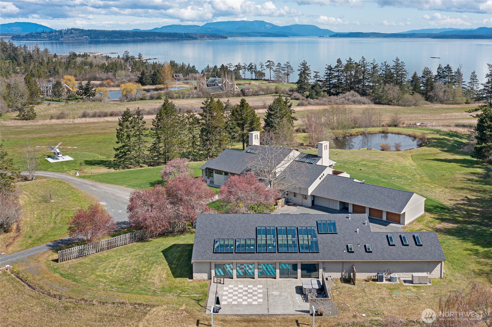 735 Rosler Road San Juan Island, WA 98250 - Photo 31 of 40 a view of a lake with a mountain in the background