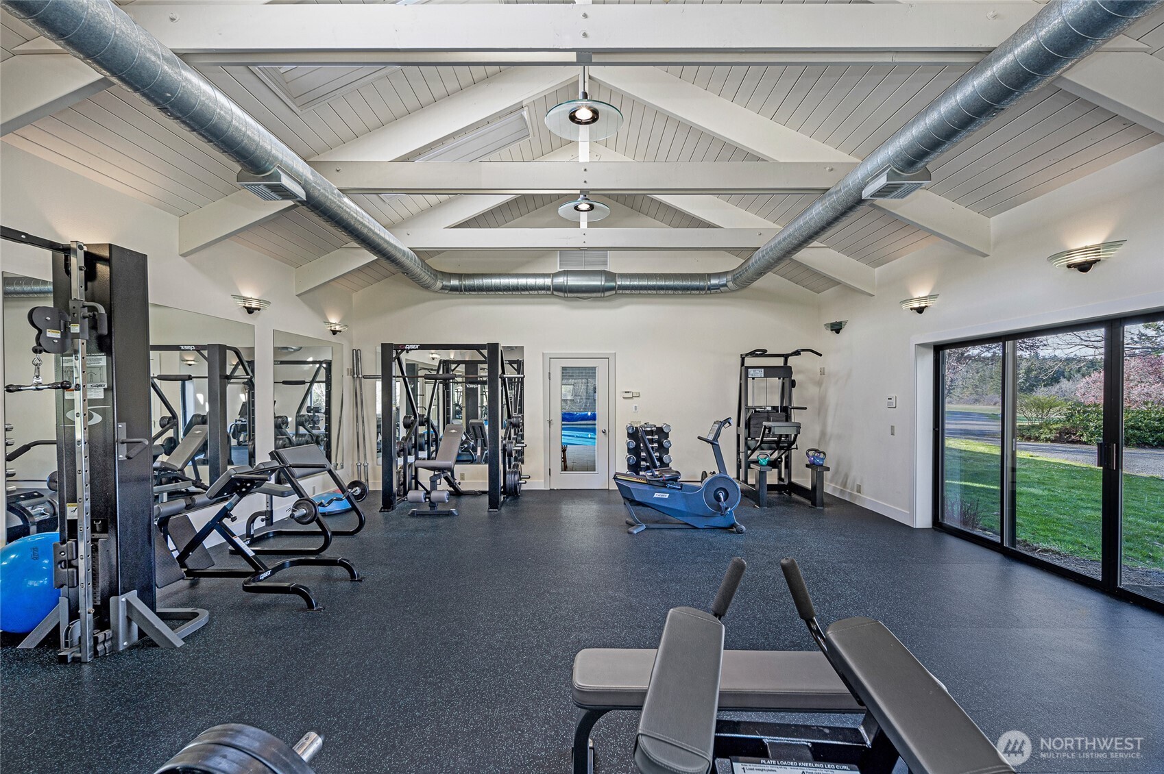 735 Rosler Road San Juan Island, WA 98250 - Photo 32 of 40 a view of a room with gym equipment