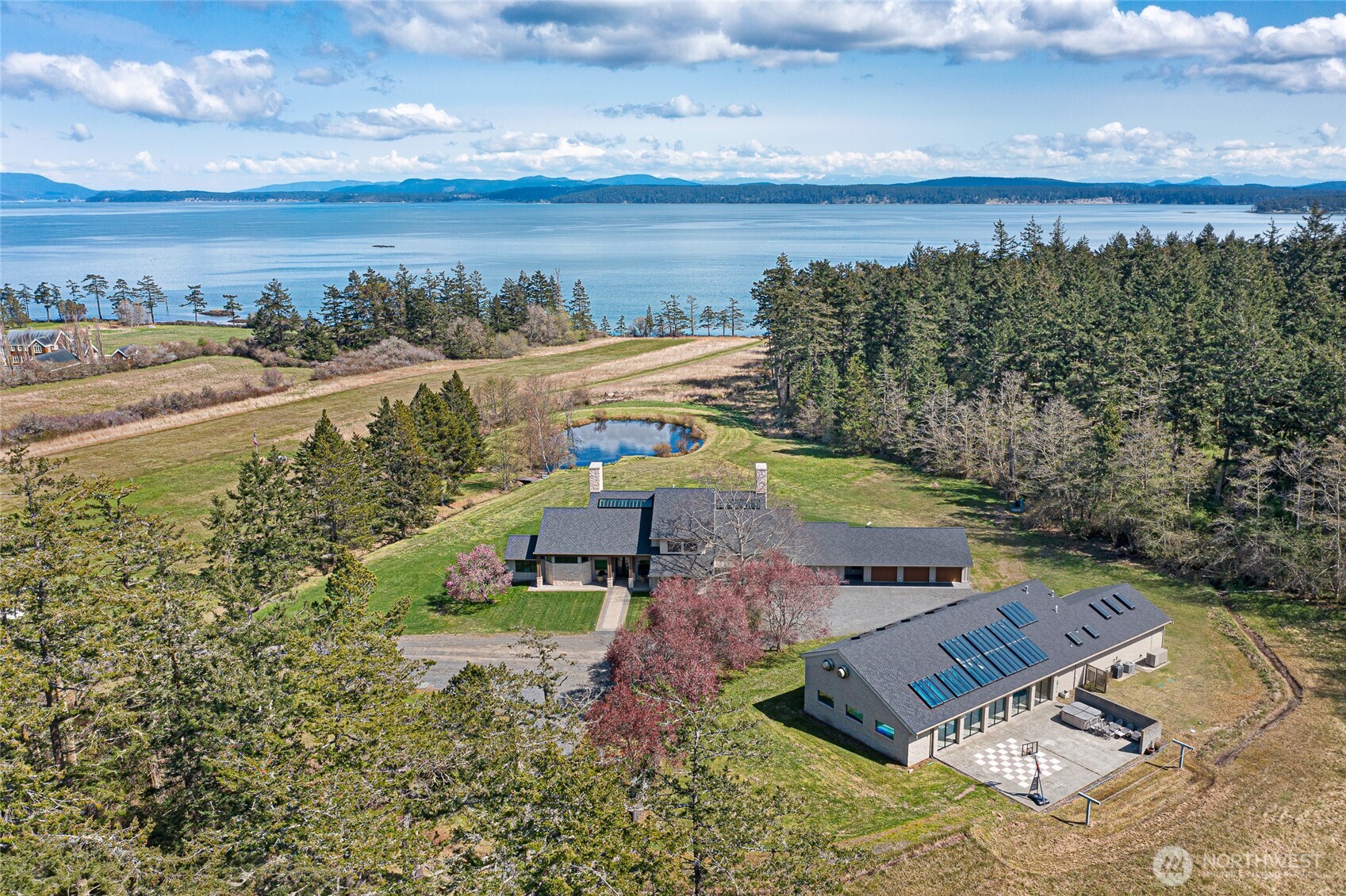 735 Rosler Road San Juan Island, WA 98250 - Photo 7 of 40 a view of a city and an ocean view