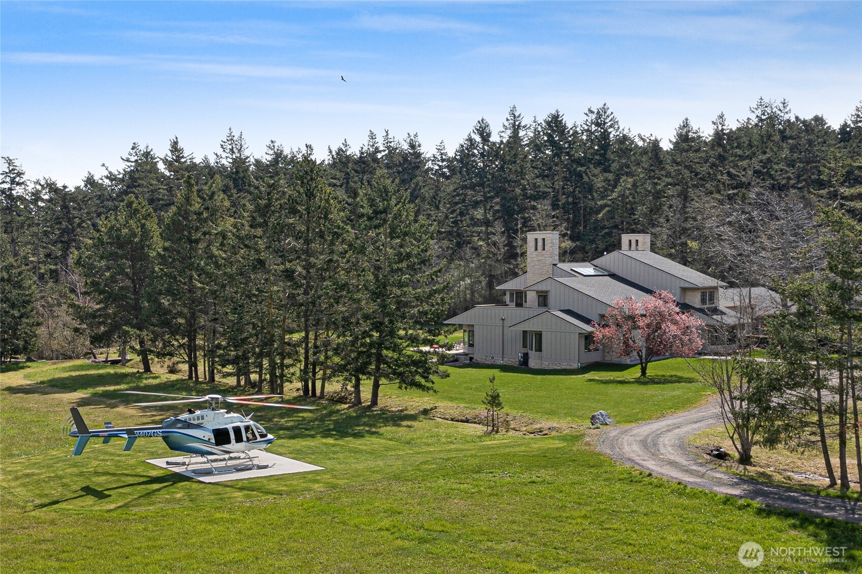 735 Rosler Road San Juan Island, WA 98250 - Photo 9 of 40 an aerial view of a house with swimming pool garden and outdoor seating