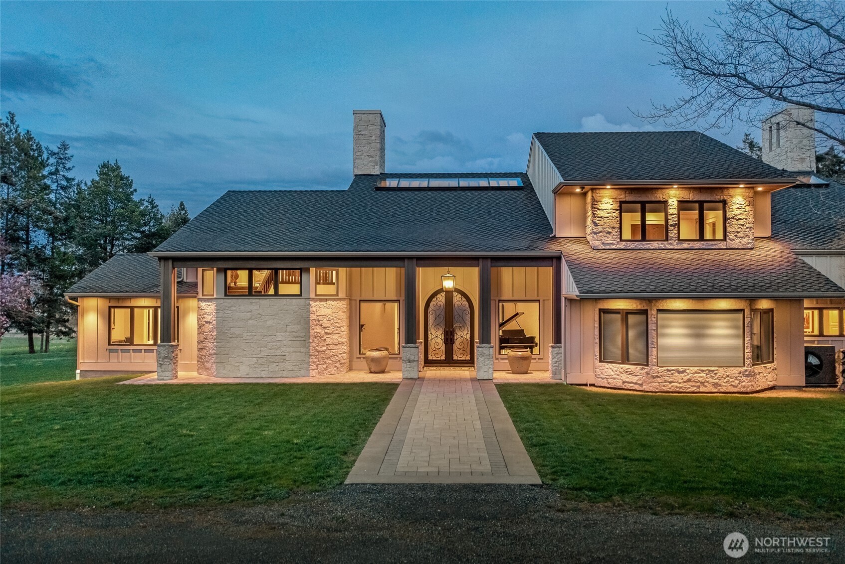 735 Rosler Road San Juan Island, WA 98250 - Photo 10 of 40 a front view of a house with a yard