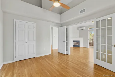 a view of livingroom with hardwood floor and ceiling fan