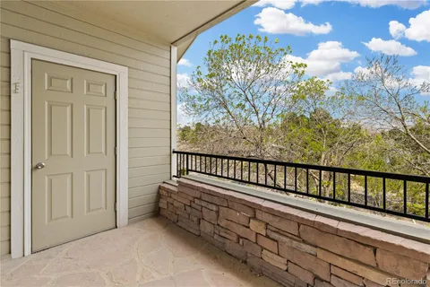 a view of a porch with a bench