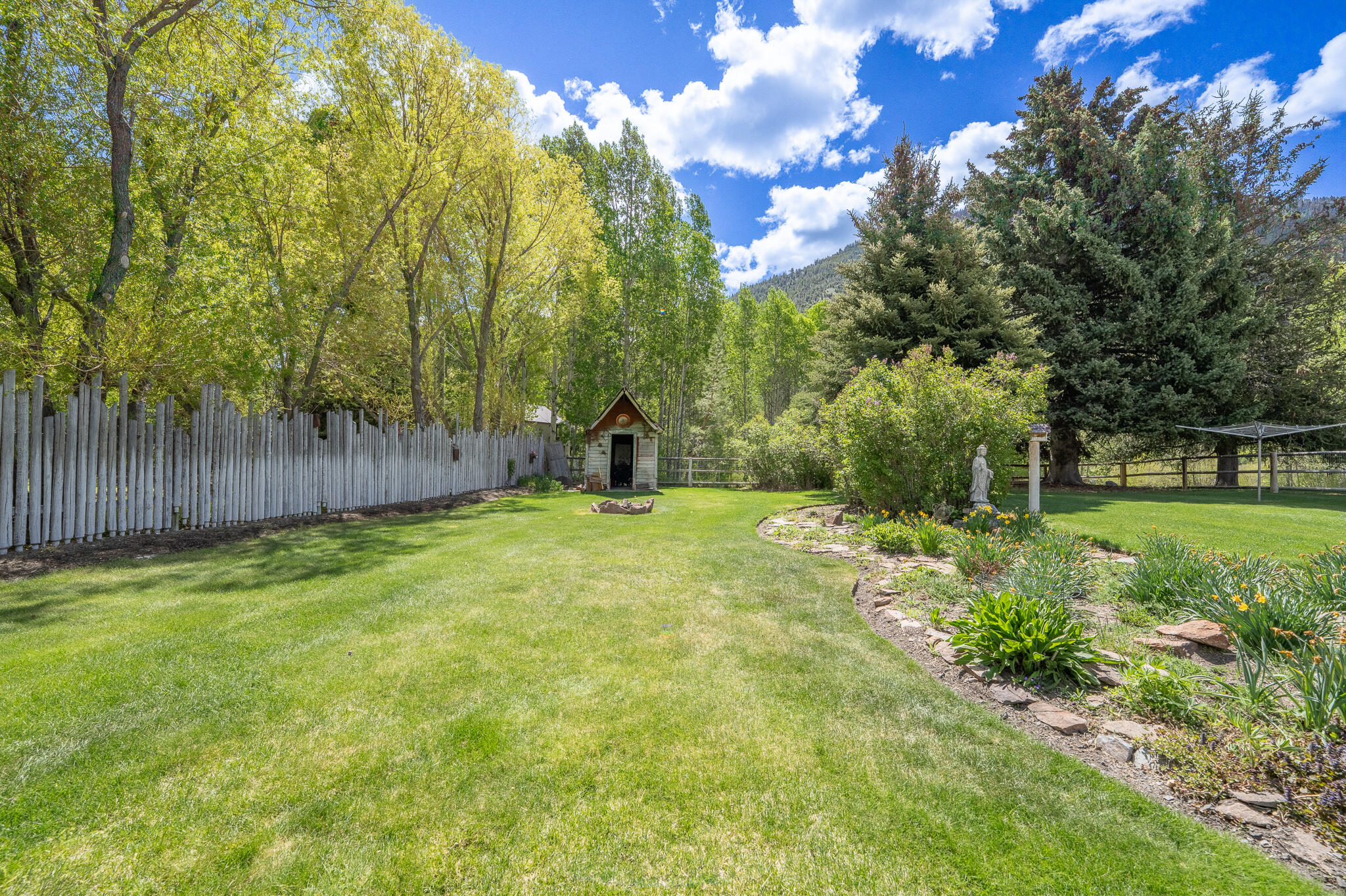 544 East Fork Road Blaine County, ID 83333 - Photo 28 of 40 Back Lawn + shed