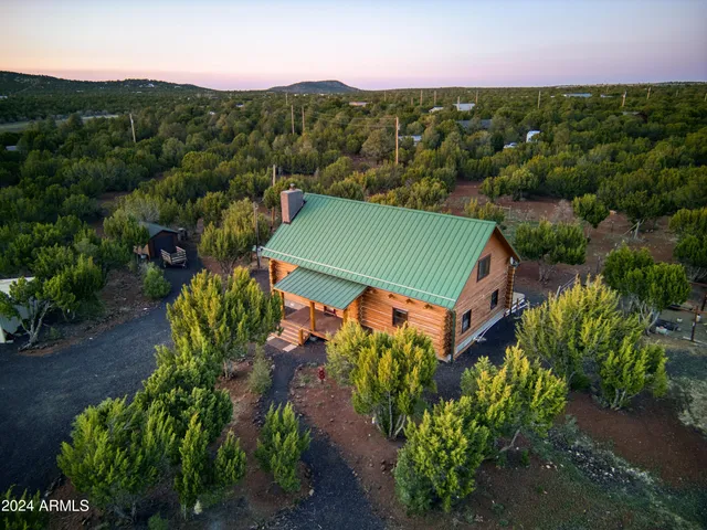 a view of deck with wooden floor and fence