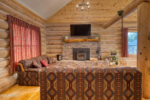 a view of a kitchen with stainless steel appliances granite countertop a large counter top