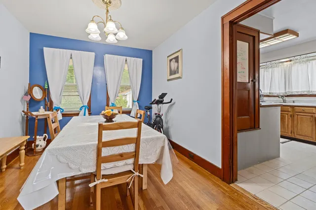 a bed room with furniture and window