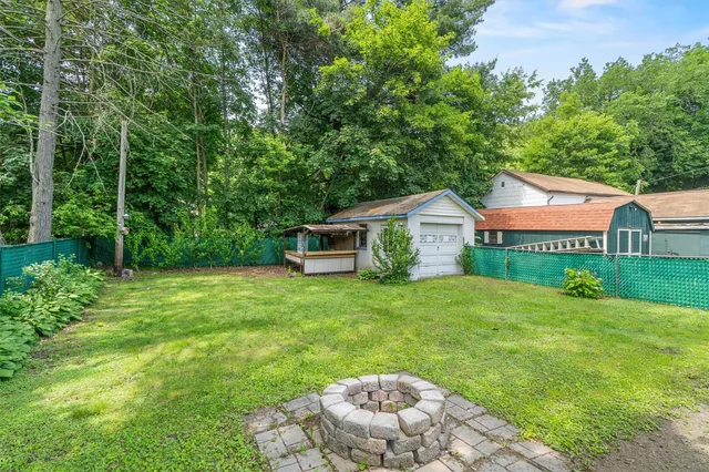 a house view with a garden space