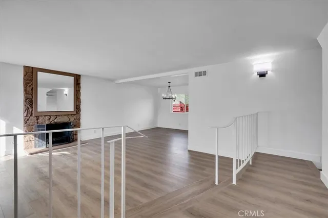 a view of livingroom with furniture and wooden floor