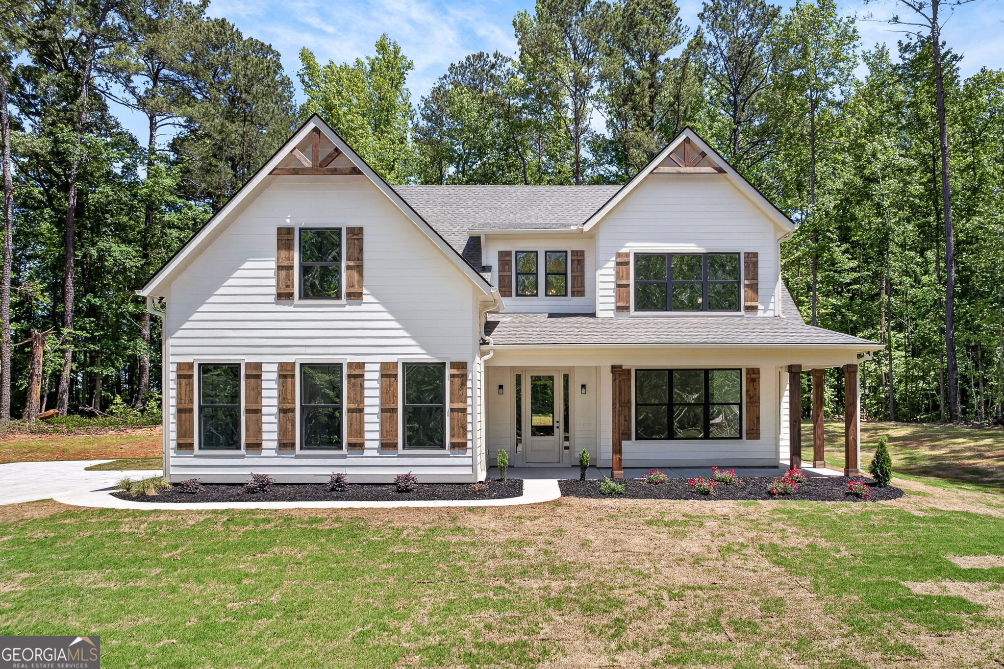 589 Buster Brown Road Jackson, GA 30233 - Photo 1 of 1 a front view of a house with a yard