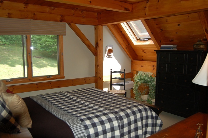 147 Reservoir Road Lenox, MA 01240 - Photo 5 of 31 a bedroom with a bed and a large window