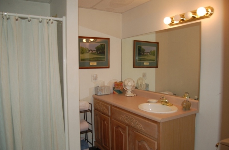 147 Reservoir Road Lenox, MA 01240 - Photo 8 of 31 a bathroom with a sink and a mirror