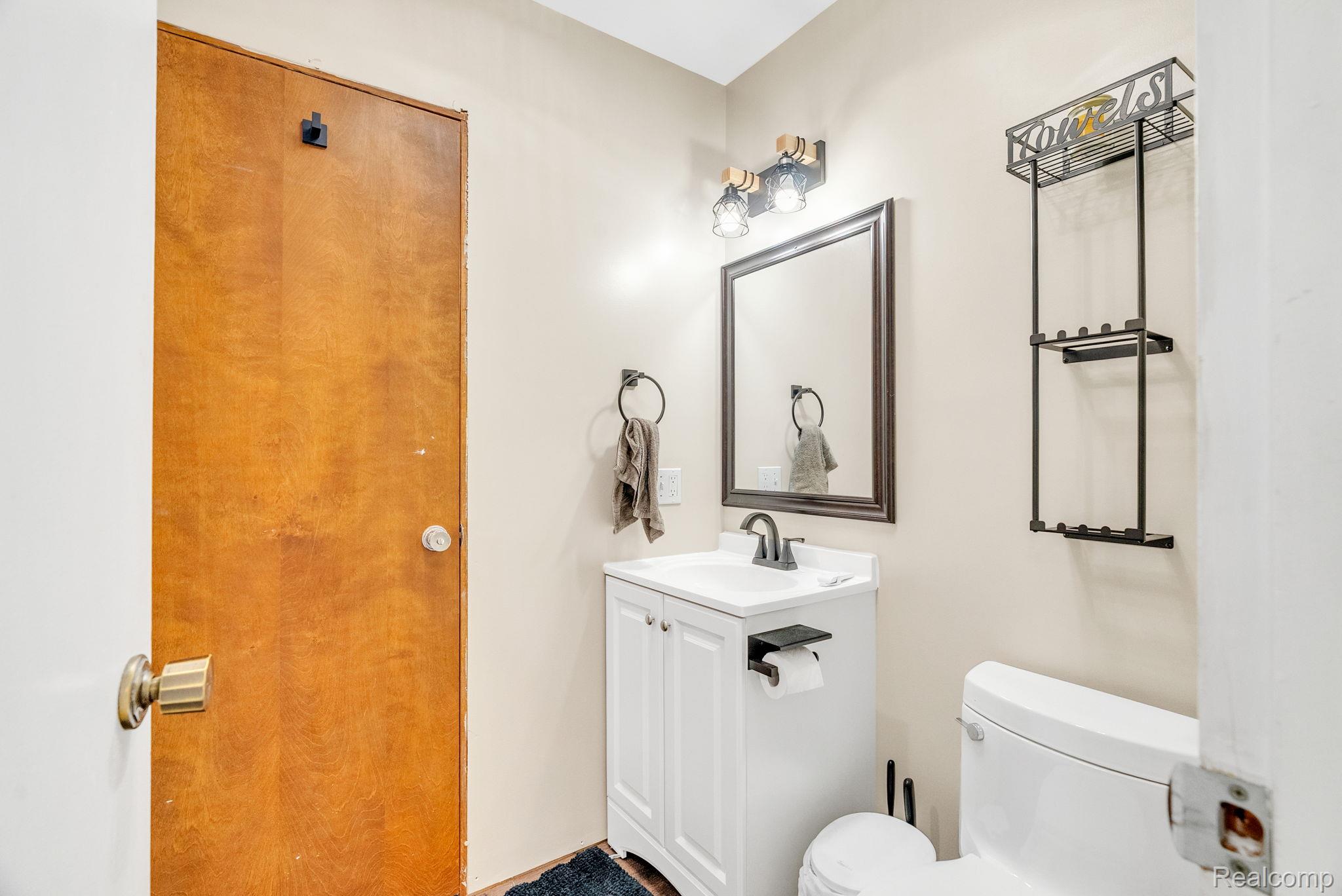 3052 South Kingston Road Kingston, MI 48741 - Photo 28 of 51 Bathroom with vanity and toilet