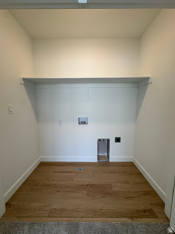 1472 North 1875 West, Unit 151 Layton, UT 84041 - Photo 13 of 20 Dedicated laundry area featuring wood-finish flooring, a built-in shelf, and crisp white walls