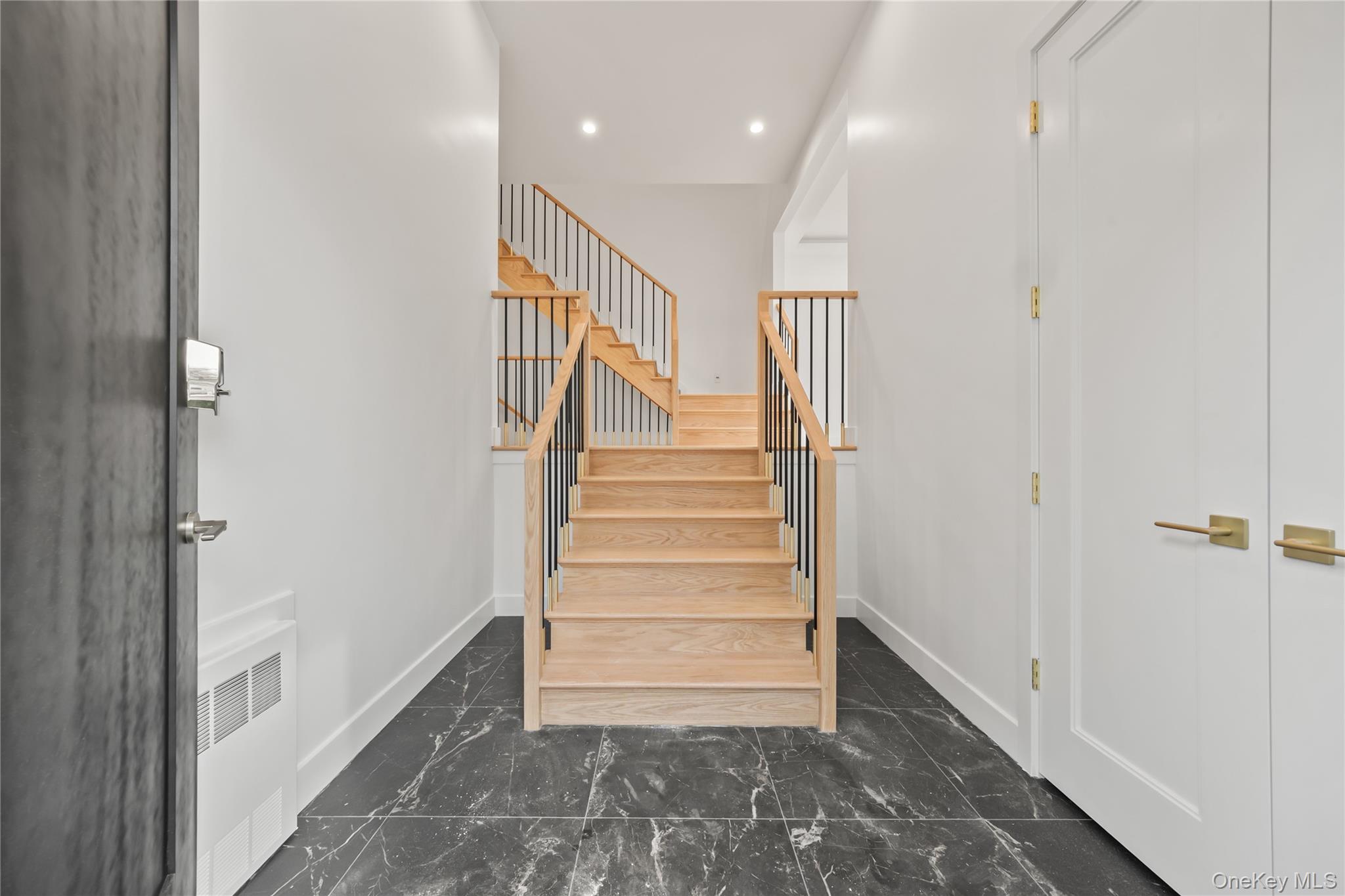 23 Singer Avenue, Unit 211 Spring Valley, NY 10977 - Photo 2 of 45 a view of entryway with wooden floor