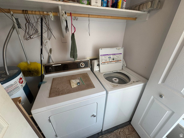 1225 North Dixie Downs Road, Unit 100 St. George, UT 84770 - Photo 19 of 22 Dedicated utility area featuring a white top-load washing machine and front-load dryer