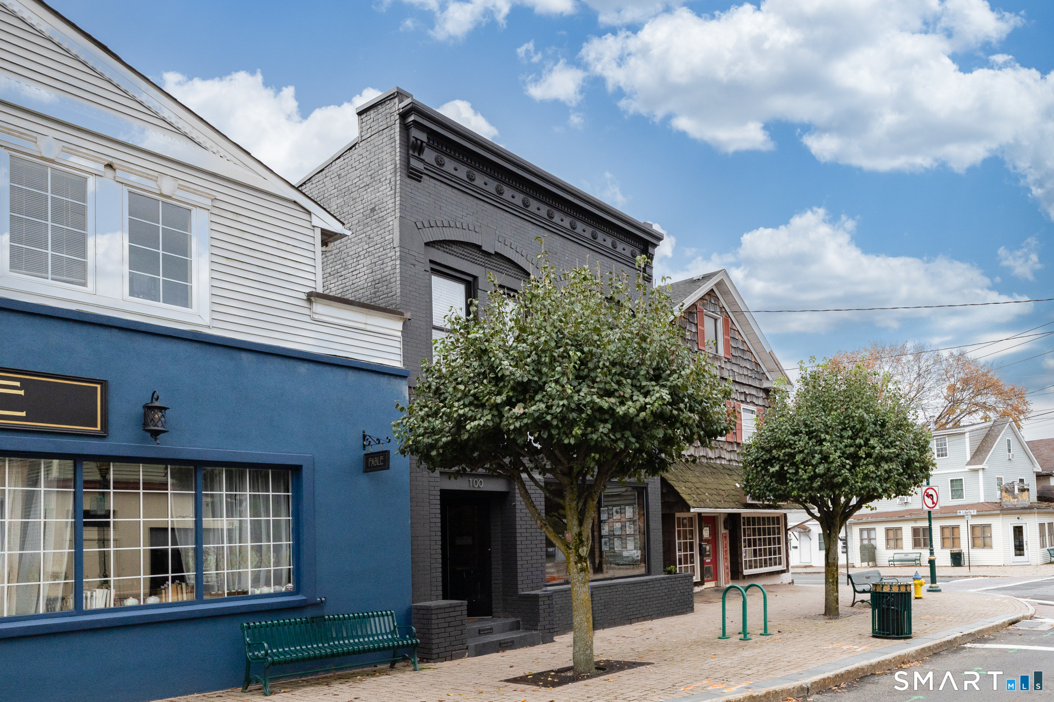 100 Center Street Southington, CT 06489 - Photo 18 of 19 a front view of a building with a garden