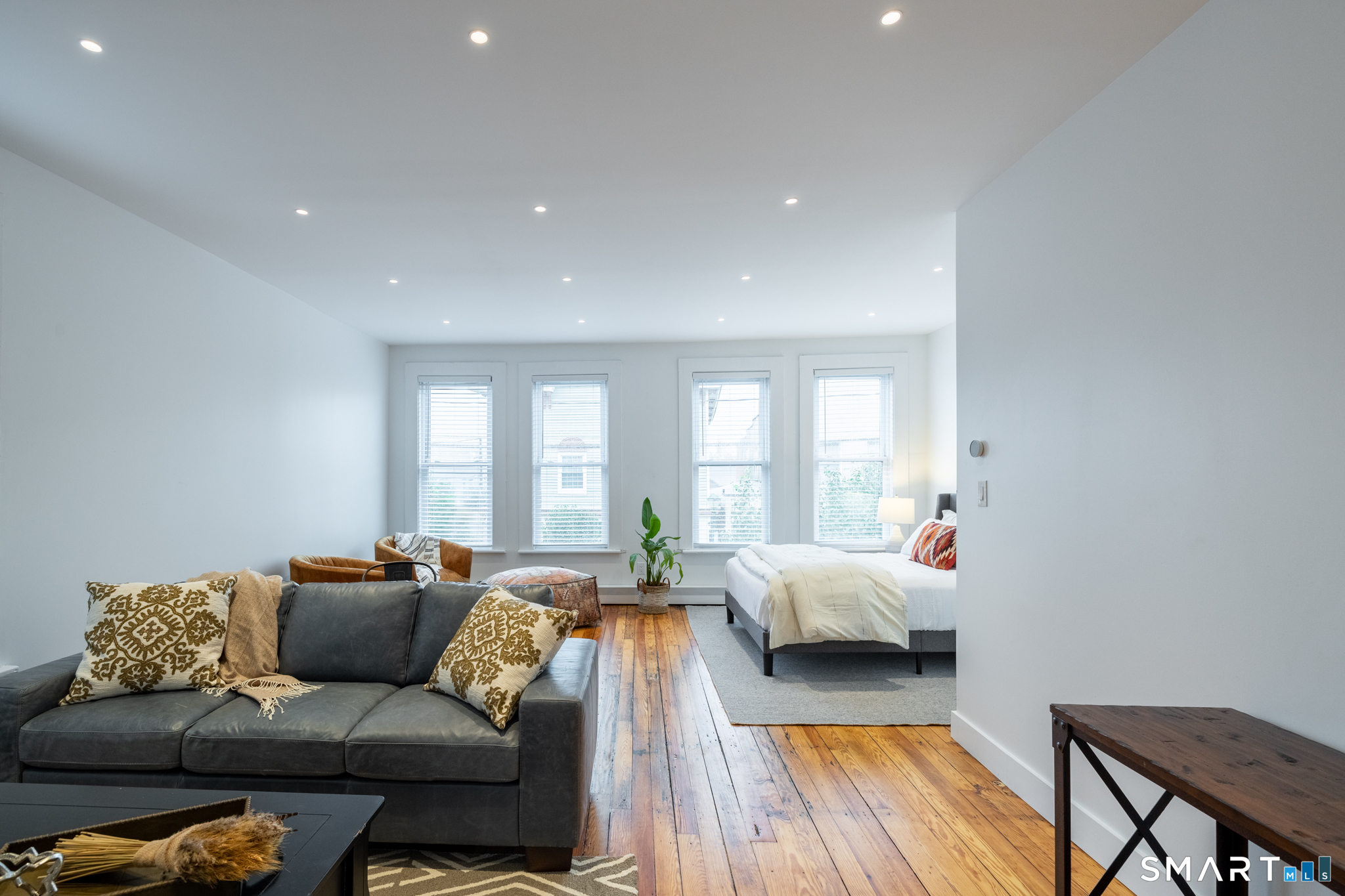 100 Center Street Southington, CT 06489 - Photo 4 of 19 a living room with furniture and wooden floor