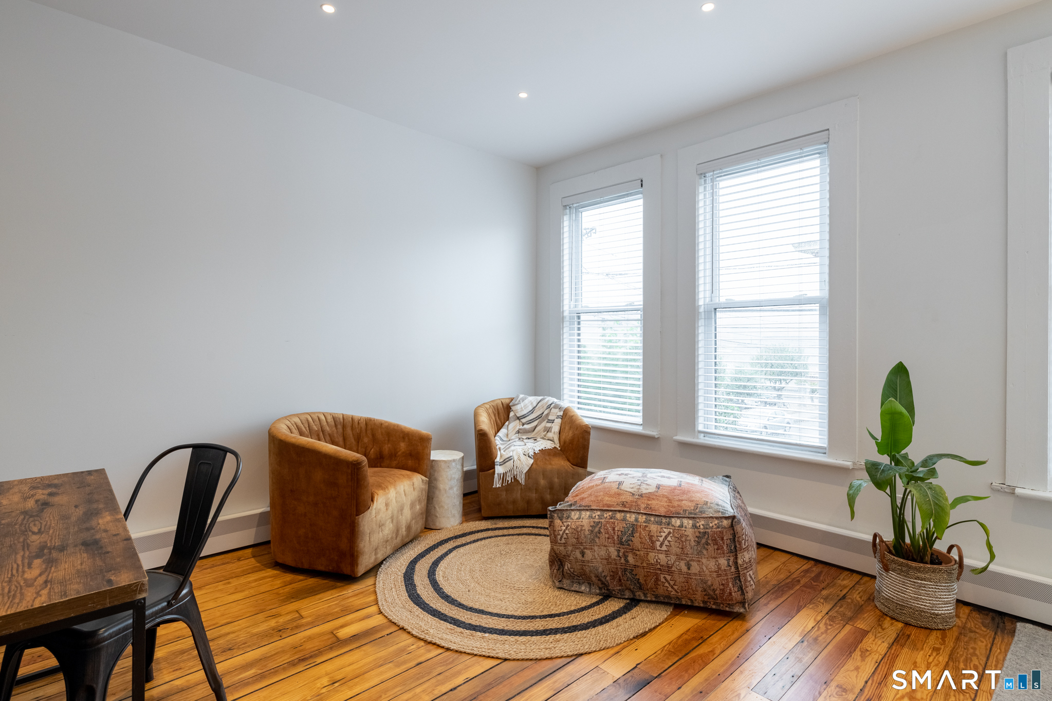 100 Center Street Southington, CT 06489 - Photo 6 of 19 a living room with furniture and wooden floor