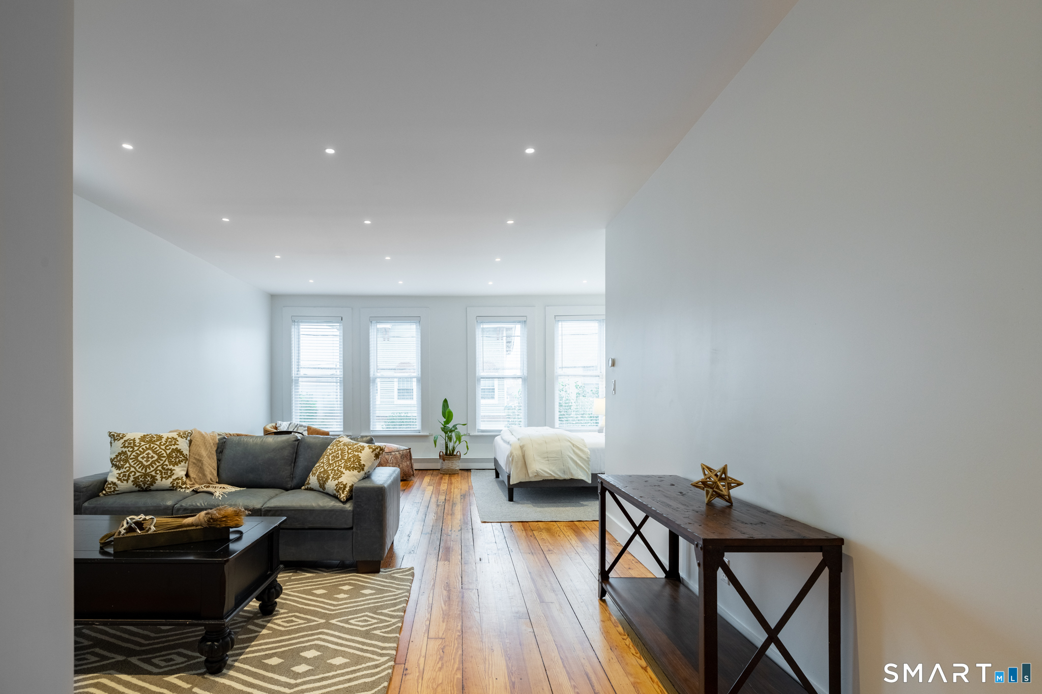 100 Center Street Southington, CT 06489 - Photo 8 of 19 a living room with furniture and a hard wood floor