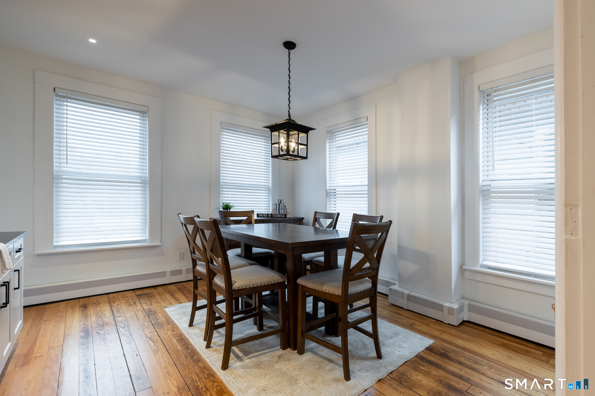 100 Center Street Southington, CT 06489 - Photo 10 of 19 a view of a dining room with furniture window and wooden floor