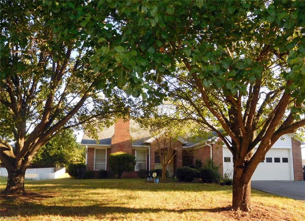 2617 Northfork Terrace High Point, NC 27265 - Photo 1 of 21 Front of house shows a small covered stoop, two car garage and nice yard