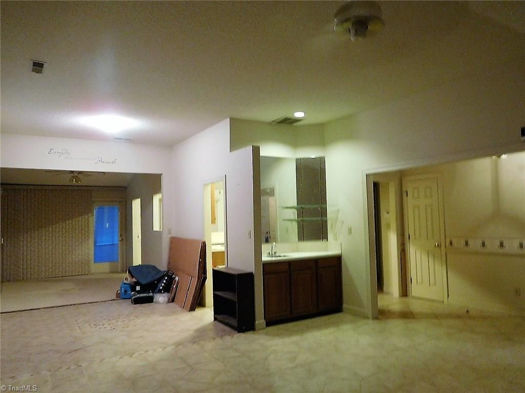 2617 Northfork Terrace High Point, NC 27265 - Photo 2 of 21 This is the Open Great Room and the wet bar, looks into the dining room, and the den