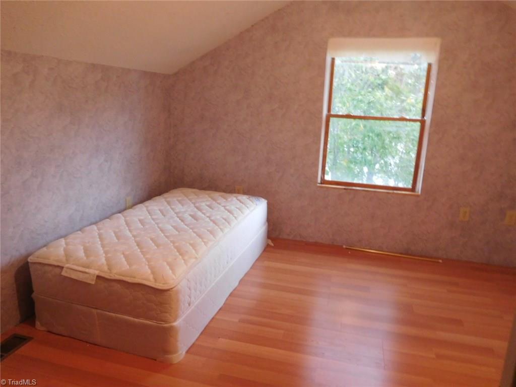 2617 Northfork Terrace High Point, NC 27265 - Photo 21 of 21 There is a bedroom, full bath and area with sink and room for microwave and small fridge up stairs over the Garage, can have a private entrance through the garage