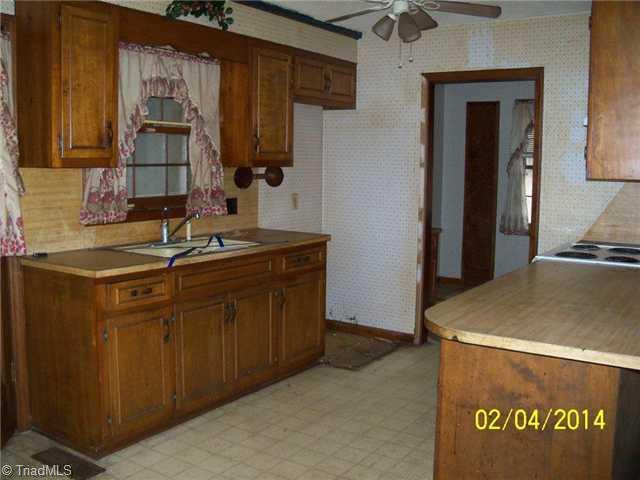 480 Rockett Road Randleman, NC 27317 - Photo 2 of 13 Kitchen. Kitchen open to Breakfast Area. Laundry Room with Sink off Kitchen