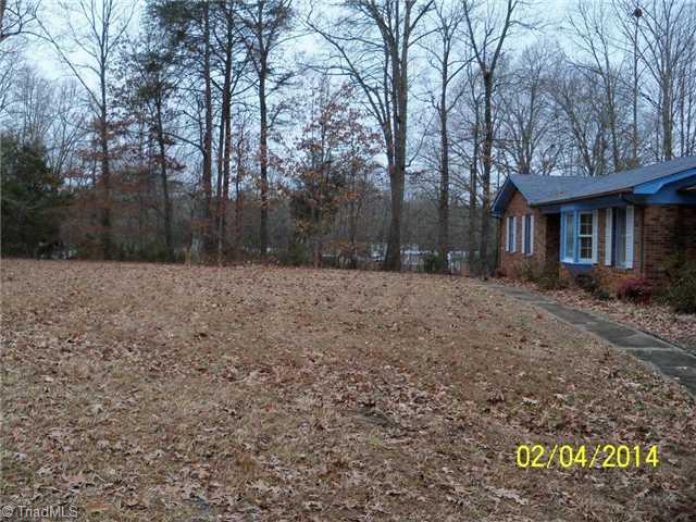 480 Rockett Road Randleman, NC 27317 - Photo 13 of 13 Land/Lot. Front Yard - Sidewalk from side garage leading to front door.