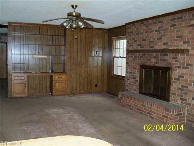 480 Rockett Road Randleman, NC 27317 - Photo 4 of 13 Den/Family/Great Room. Den just off Kitchen/Breakfast Area features FP and built-in shelving.