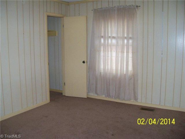 480 Rockett Road Randleman, NC 27317 - Photo 8 of 13 2nd Bedroom. Bedroom 2 with large closet. Bedroom 3 like-kind.