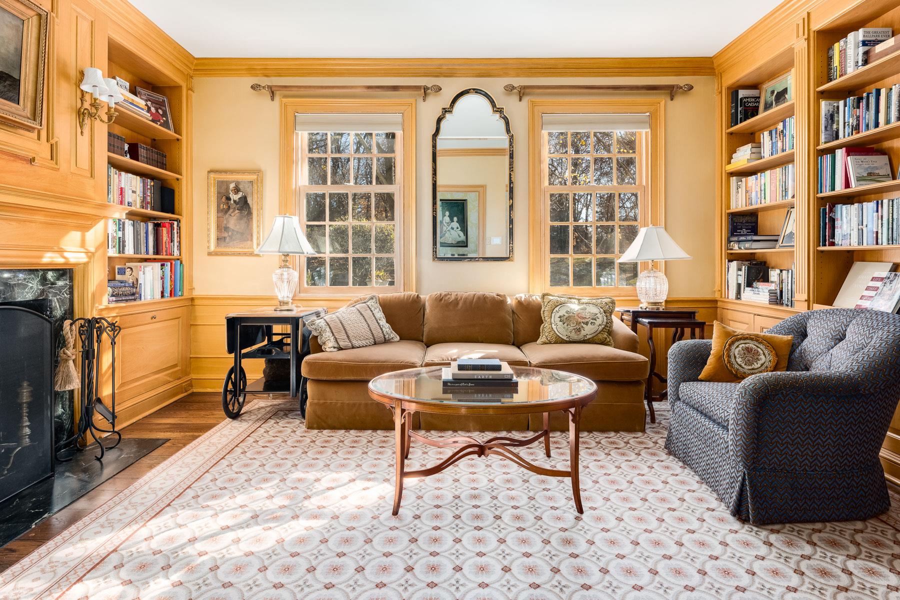 177 Old Briarcliff Road Briarcliff Manor, NY 10510 - Photo 13 of 49 a living room with furniture a bookshelf and a window