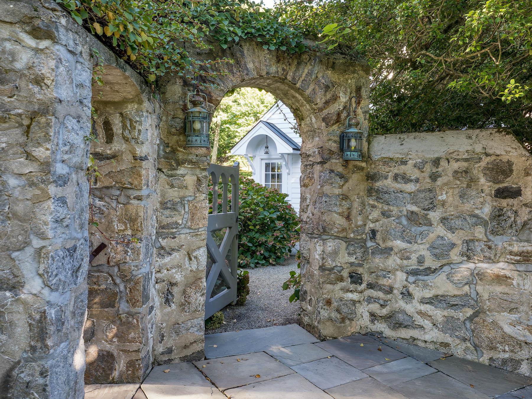 177 Old Briarcliff Road Briarcliff Manor, NY 10510 - Photo 34 of 49 a front view of a house with a yard