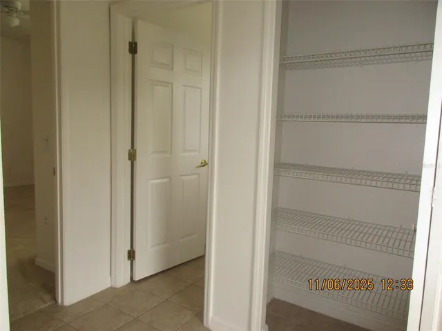 a view of an empty walk in closet