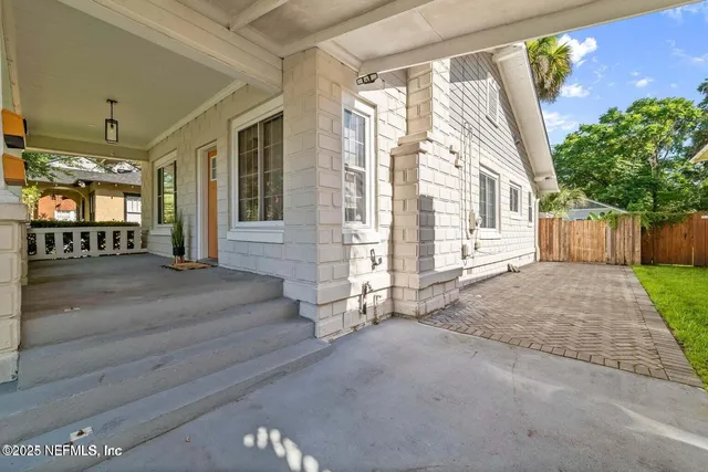 a view of a house with a street