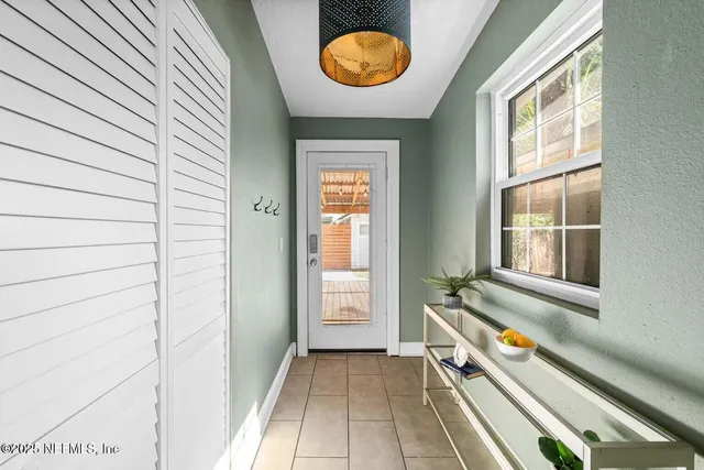 a view of an entryway with sitting area