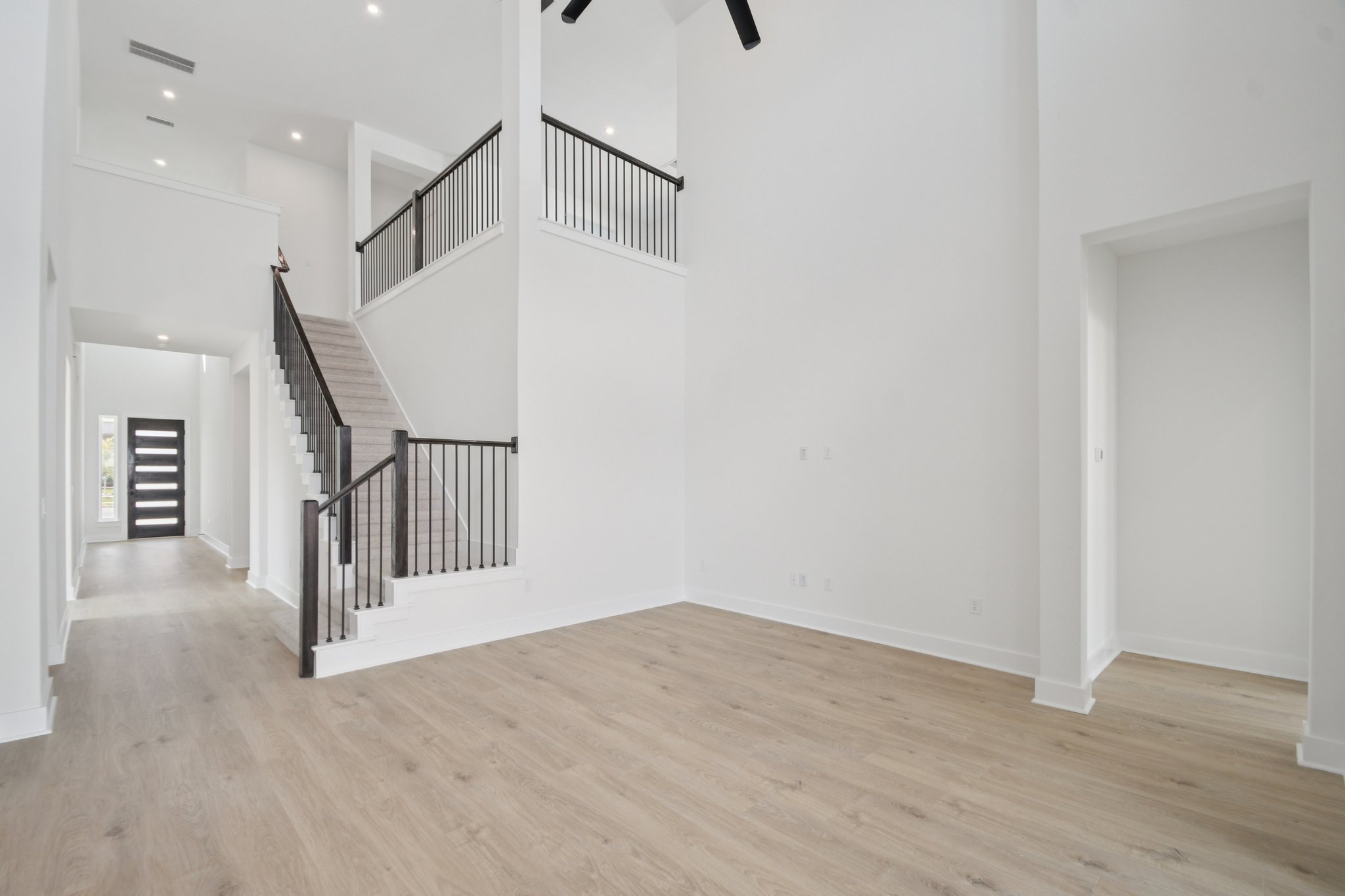 1660 Cardinal Lane Round Rock, TX 78681 - Photo 4 of 35 a view of a hallway with stairs