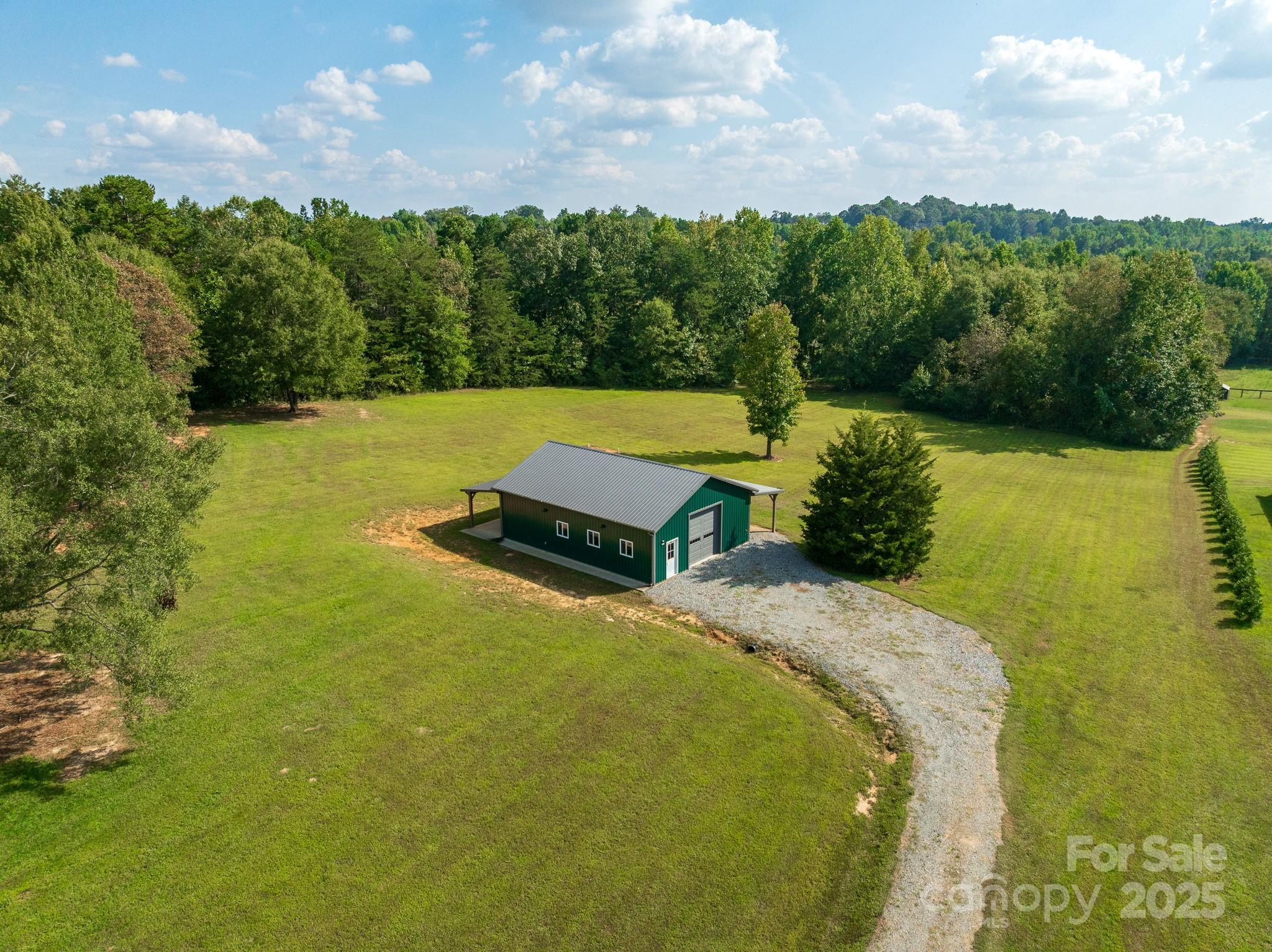 185 Robinson Acres Cove Lane Rutherfordton, NC 28139 - Photo 25 of 37 a view of a lake with a yard