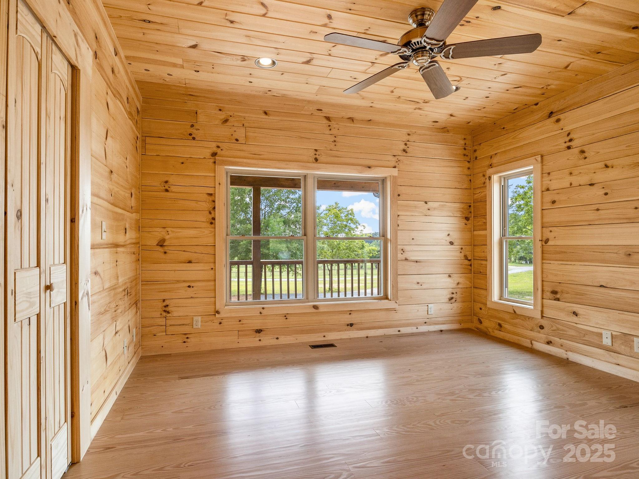 185 Robinson Acres Cove Lane Rutherfordton, NC 28139 - Photo 10 of 37 a view of a livingroom with wooden floor and a window
