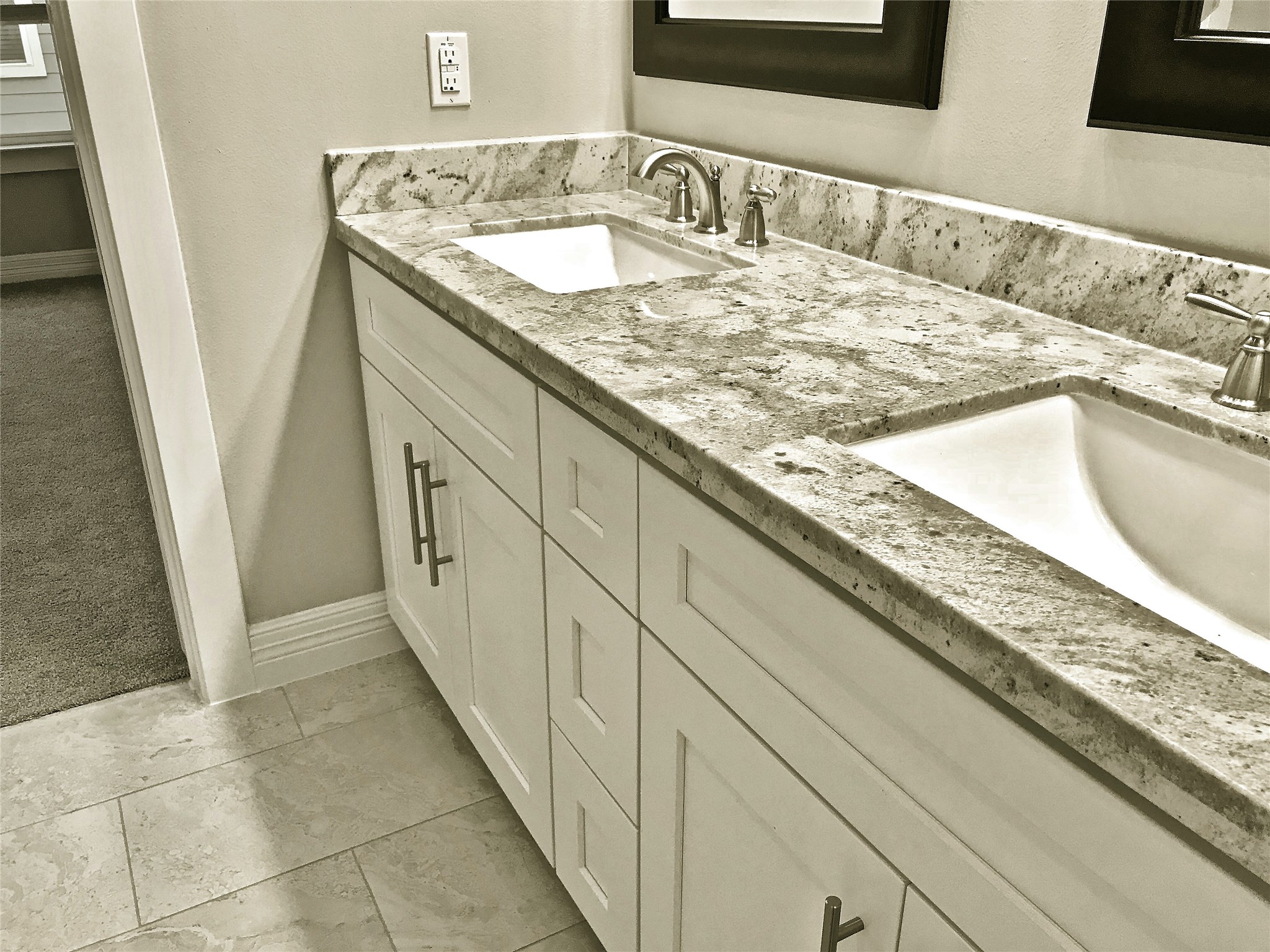 709 Link Road Houston, TX 77009 - Photo 22 of 46 a bathroom with a granite countertop sink and a mirror