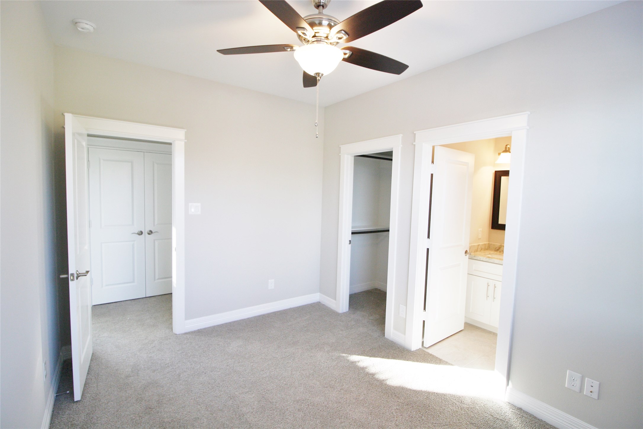709 Link Road Houston, TX 77009 - Photo 32 of 46 a view of a room with a ceiling fan and a window